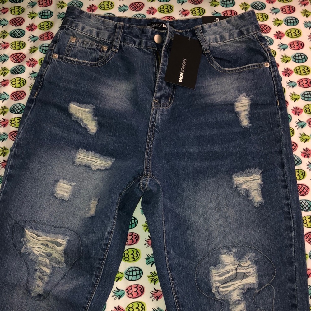 Distressed boyfriend jeans